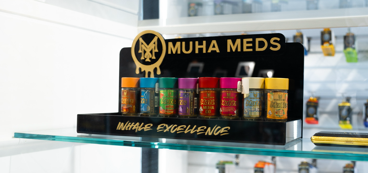 Muha Excellence display stand with premium vape cartridges