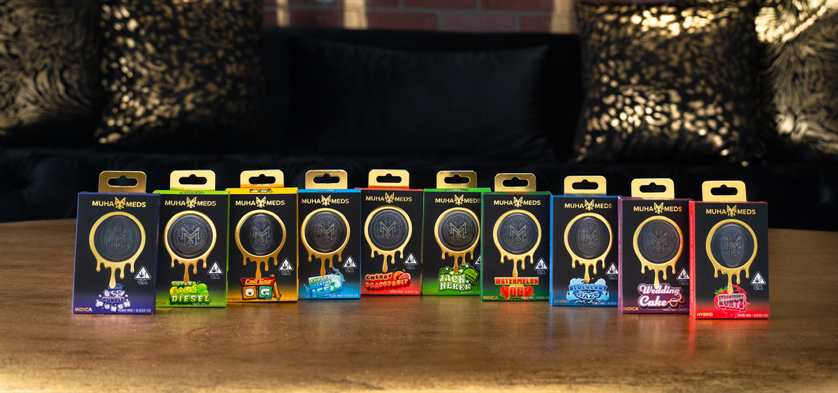 Row of authentic Muha Meds cartridges showing variety of strains and flavors